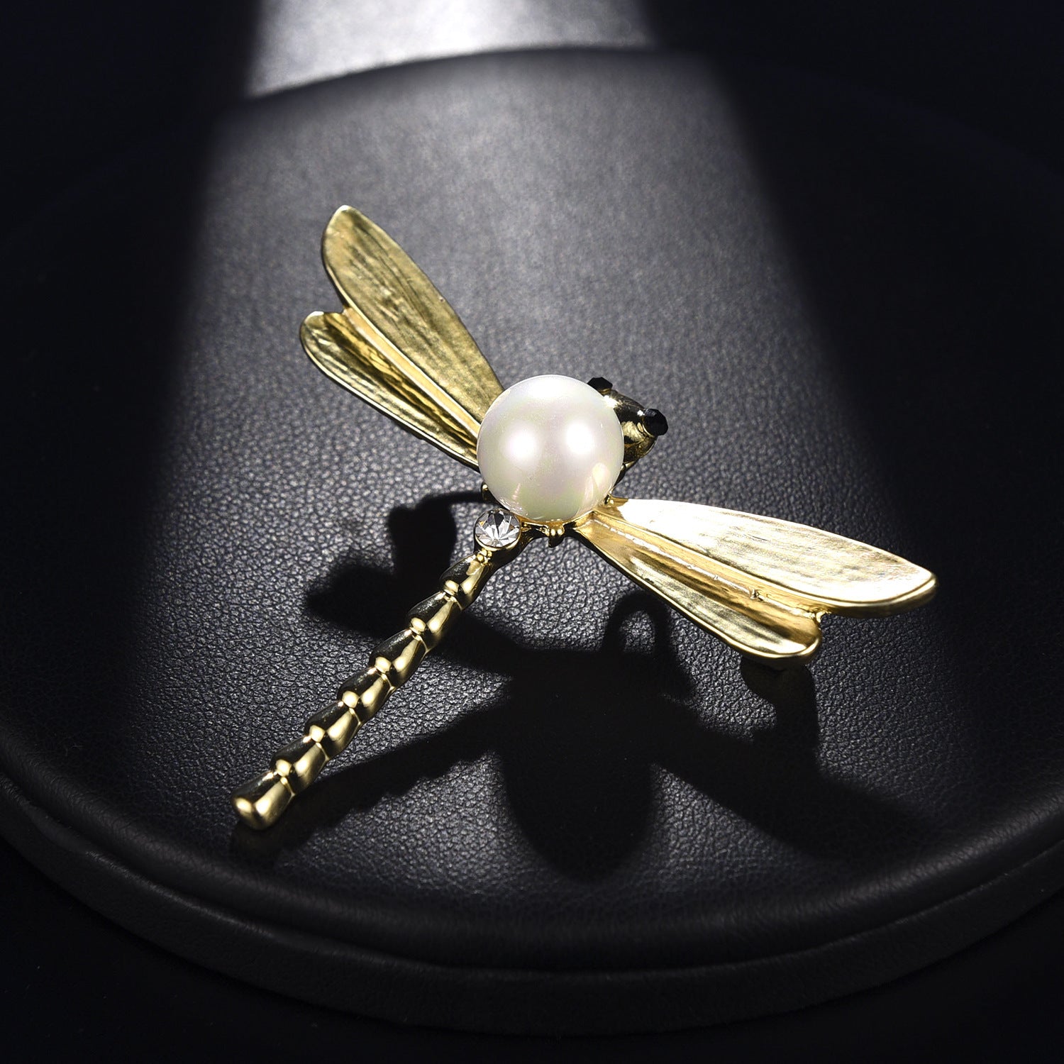 Insect golden pearl brooch