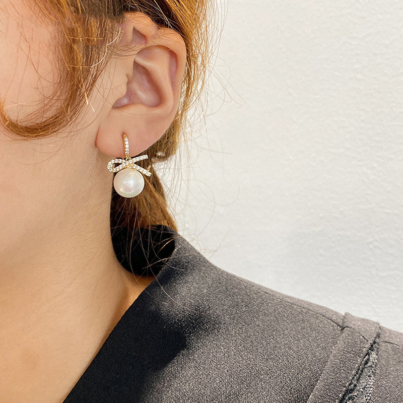 Bow pearl earrings