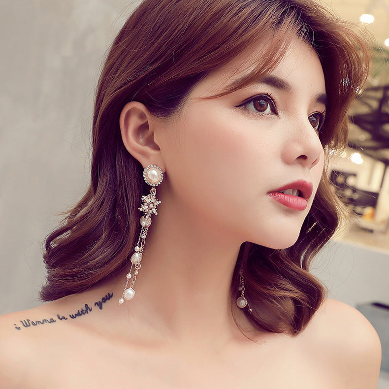 Long pearl earrings